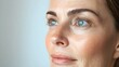 © Alpha - Article documenting long-term facelift results, showing before-and-after pictures where deep wrinkles and fine lines are replaced by a more youthful, lifted appearance