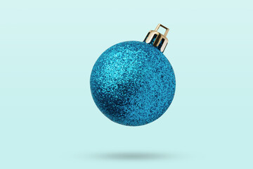 Wall Mural - Blue Christmas ball isolated on blue background