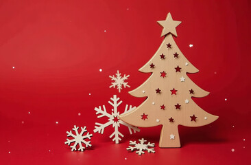 Festive wooden christmas tree with snowflakes on red background