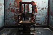 © Serhii - Historical electric chair in a dimly lit abandoned execution chamber showcasing decay and neglect