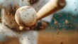 © familymedia - A close-up shot of a baseball in contact with the bat as dirt flies, showcasing the powerful energy and competitive spirit of this popular outdoor sport.