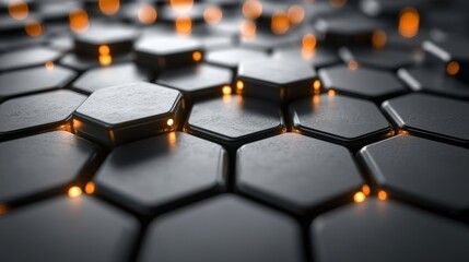 Poster - A floor made of hexagonal black tiles features embedded glowing orange lights, creating an inviting yet modern ambiance in a low-light space.