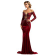 © Roman - A full-length portrait of a woman wearing a luxurious red gown. The dress features sequins, a plunging neckline, and a fitted silhouette. She stands with one hand on her hip