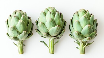 Poster - Three fresh artichokes on a white background viewed from above Emphasizing healthy eating and organic food concepts