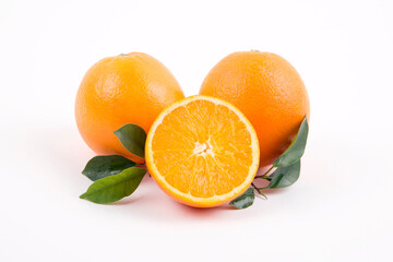 oranges with leaves on a white background