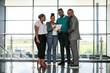 © JonoErasmus - Diverse African Business Team Collaborating in Modern Office Building