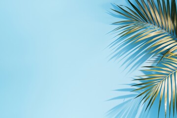 Poster - A vibrant tropical scene featuring lush green palm leaves against a soft blue background, perfect for summer themes and nature-inspired designs.