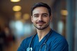 © BG - Gentle Doctor in Blue Scrubs with Stethoscope