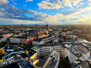 Aerial view of German City of München seen from tower of New Town Hall on a blue cloudy autumn day. Photo taken November 7th, 2023, Munich, Germany.