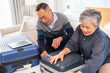 © Art_Photo - Senior couple packing suitcase for travel, asian elderly preparing for vacation, grandparents organizing luggage, retirement travel planning enjoying trip preparation packing essentials for holiday