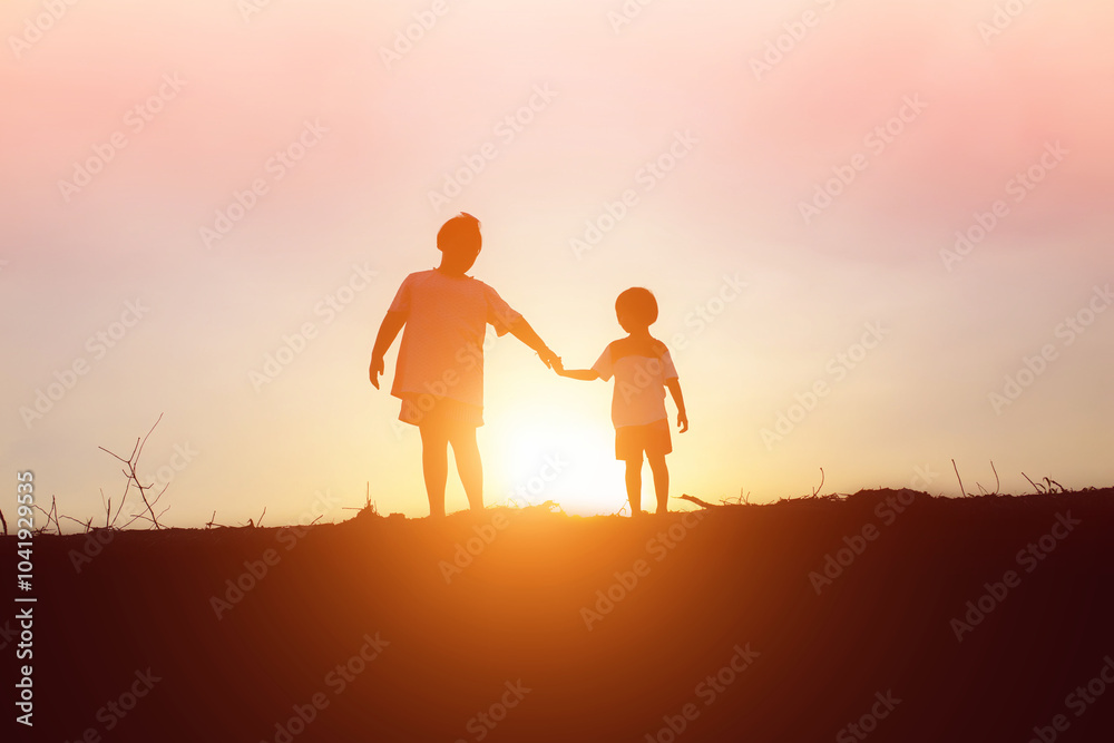 kid silhouette,Moments of the child's joy. On the Nature sunset