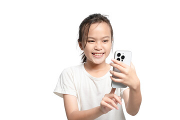 A young girl is holding a cell phone and smiling