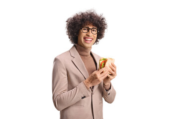 Guy eating a cheese and tomato sandwich