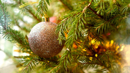 Wall Mural - Christmas tree toys on the Christmas tree, blurred background.