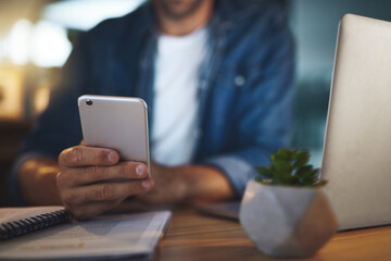 Canvas Print - Office, phone and hands of businessman at night for social media, networking and contact. Working late, professional and person on smartphone and laptop for online chat, internet research and website