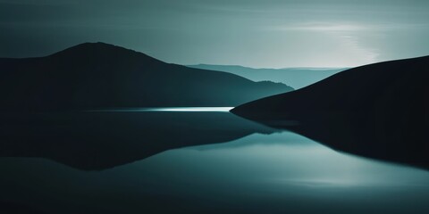 Poster - Serene Landscape: Dark Mountains Reflected in Calm Water Under a Soft Blue-Hued Sky, Ideal for Tranquil Atmosphere Designs