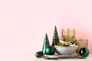 Wall Mural - Decorated Christmas table setting on pink background