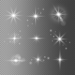 Wall Mural - set of sparkle stars with realistic light effect. flash light on transparent background. shiny magic