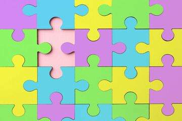 Sticker - Many colorful puzzle pieces on pink background, top view. Symbol of autism