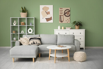 Sticker - Cozy sofa and coffee table in interior of living room