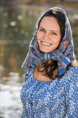 Russian beauty - young beautiful woman in a traditional headscarf