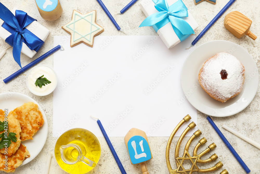 Blank greeting card with traditional Hanukkah symbols on white background