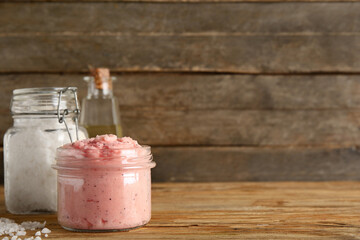 Canvas Print - Jars of natural body scrubs and oil on wooden background