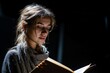 © Maelgoa - Portrait of a woman reading poetry on stage, spotlight, black background, close-up view, emotional expression 4