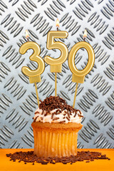 Canvas Print - Chocolate cupcake with candle number 350 - Birthday on industrial metallic background.