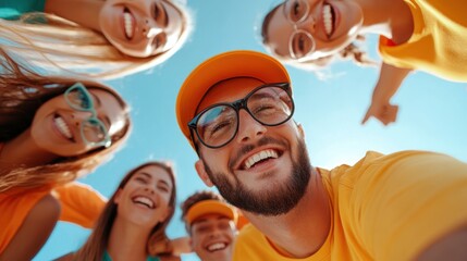 A group of excited friends come together under an azure sky, their bright smiles and shared energy embody the joy and friendship of a carefree, sunny day.