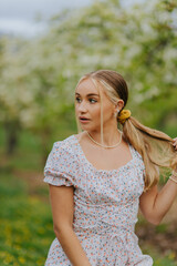 Portrait on a stool in a spring orchard 4