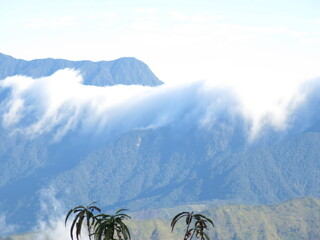 Fluffy clouds in the clear blue sky in Moc Chau, Vietnam: Peaceful and quiet nature