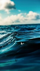 serene beauty of ocean waves glistens under sunlight, creating tranquil atmosphere with gentle dropl