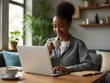 © Blind  - Young black woman using laptop while drinking tea at home, Generated AI