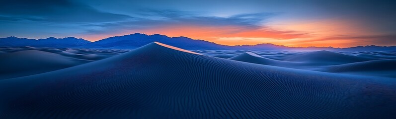 Poster - A serene desert landscape at twilight, showcasing rolling dunes under a gradient sky with hints of sunset in the background.