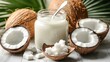 © pinporn manosri - Coconut Oil Jar with Fresh Coconut Halves and Spoon