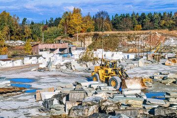 Canvas Print - Stone quarry with a Wheel loader