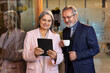© G-images - Seniors business people enjoying work together using tablet for online project discussing