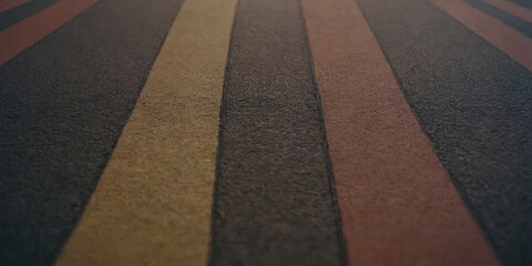 Poster - A close up of a road with a stripe of yellow on it