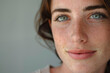 © Ira - Close-up Portrait of a Young Woman With Captivating Green Eyes and Natural Freckles