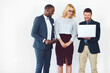© Arnell Koegelenberg/peopleimages.com - Business people, laptop and support with meeting, thinking and studio wall or creative agency for project. Teamwork, problem solving and diversity with planning mockup space on white background