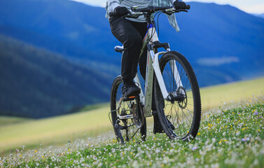 Wall Mural - Riding mountain bike on beautiful mountain top