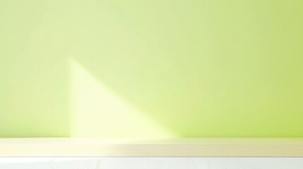 Poster - Inviting empty wooden table bathed in natural sunlight against a serene green wall, perfect for showcasing products and creating a clean, modern aesthetic