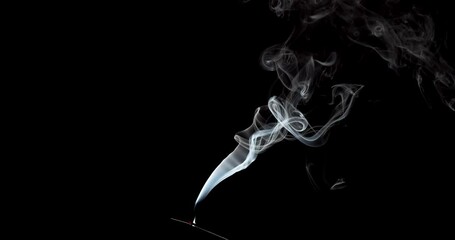 Wall Mural - Real smoke on a black background. Thin Flexible Trickle of Real Smoke. Colorful real smoke rises up. Ideal for background or over-layer with blending mode add, screen, lighten.