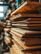 © SashaMagic - Stacked wooden planks in a workshop setting