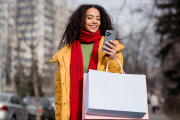 Photo of cute pretty girl wear stylish jacket hold phone walk downtown boutique store mall center outdoors outside