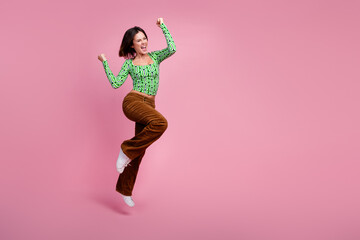 Wall Mural - Photo of lovely crazy cheerful woman wear green clothes celebrate sale isolated on pink color background