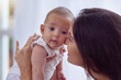 © peopleimages.com - Mother, baby and bonding with portrait in home for affection, playing or support with growth. Comfort, newborn or happy woman in nursery together with security, protection or morning routine for love