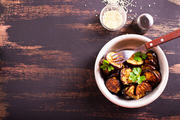 Poster - fried egg plant with spice in bowl