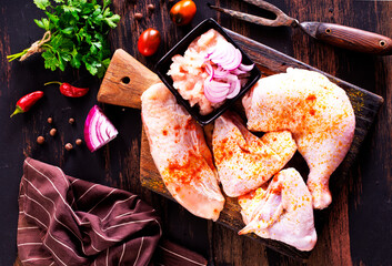 Wall Mural - fresh chicken meat on a wooden table